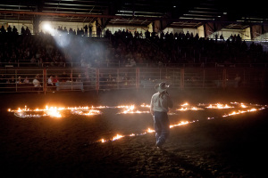 The announcer addresses the crowd before the first night of the Rocky Mountain Extreme Bull Riding Challenge at Majestic Valley Arena.