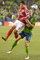 Portland Timbers Sal Zizzo, left, and Seattle Sounders Tyson Wahl collide during the Portland Timbers’ 1-1 tie with the Seattle Sounders at Qwest Field in Seattle, Wash.